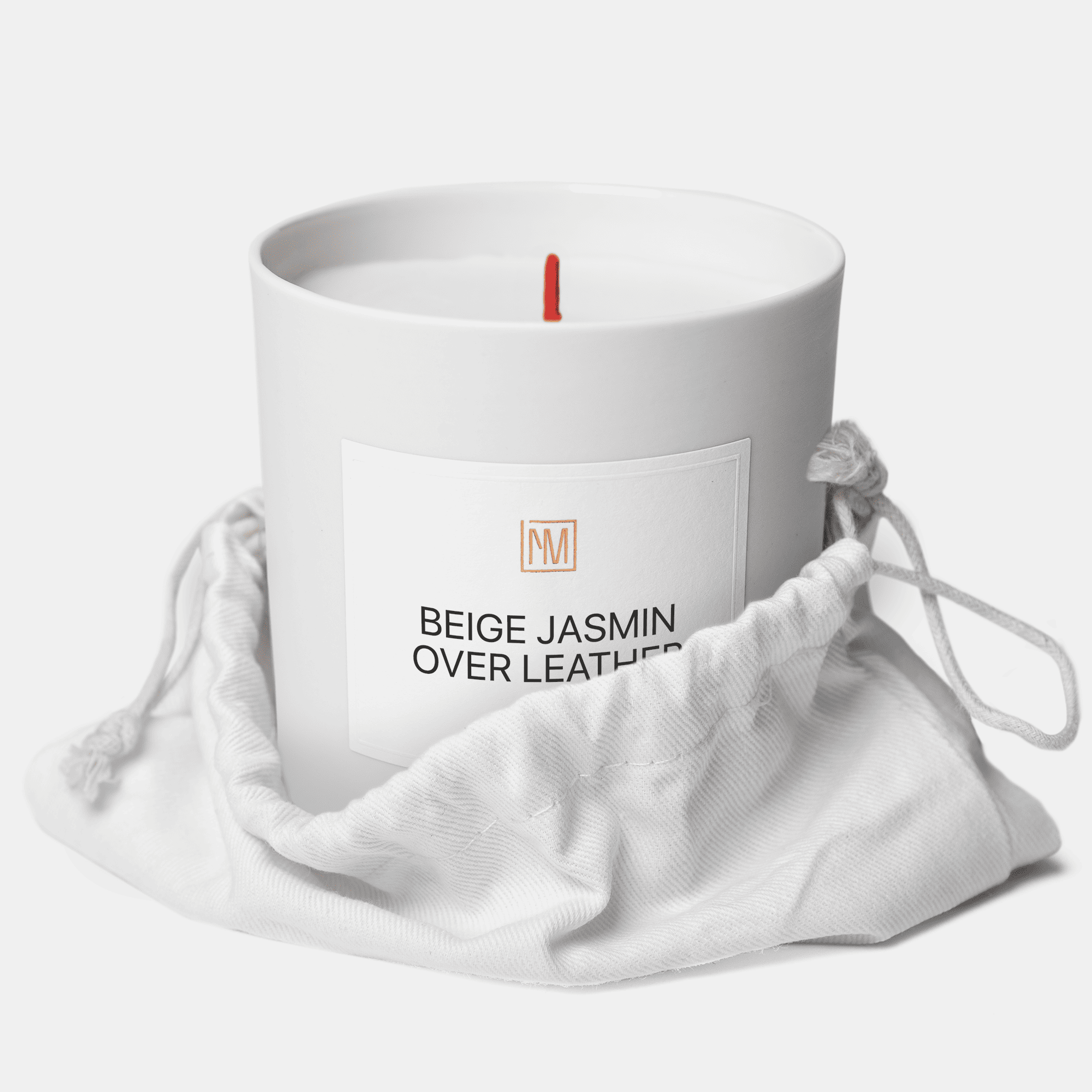 beige jasmin over leather scented candle in a bag