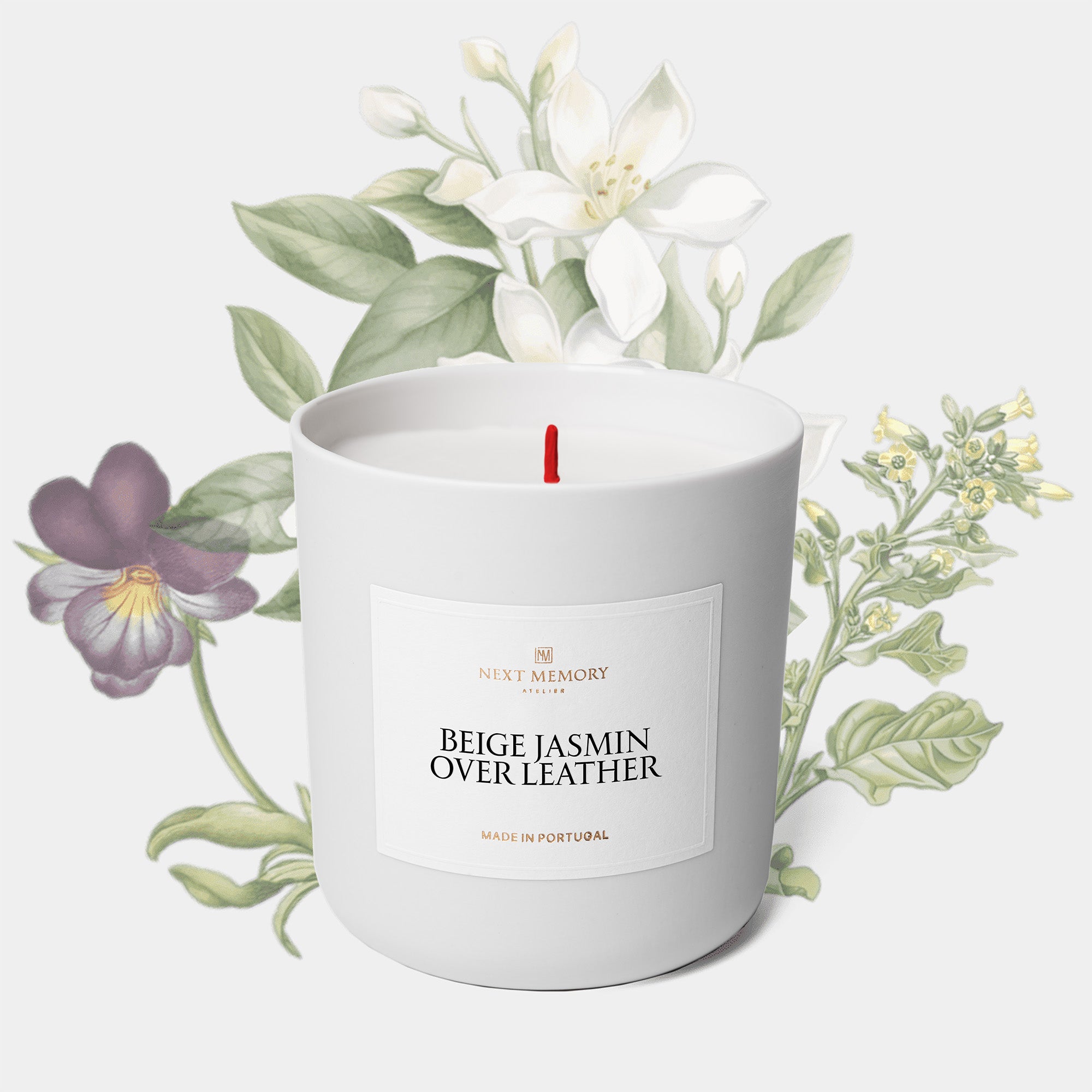 beige jasmin candle with flowers in the background