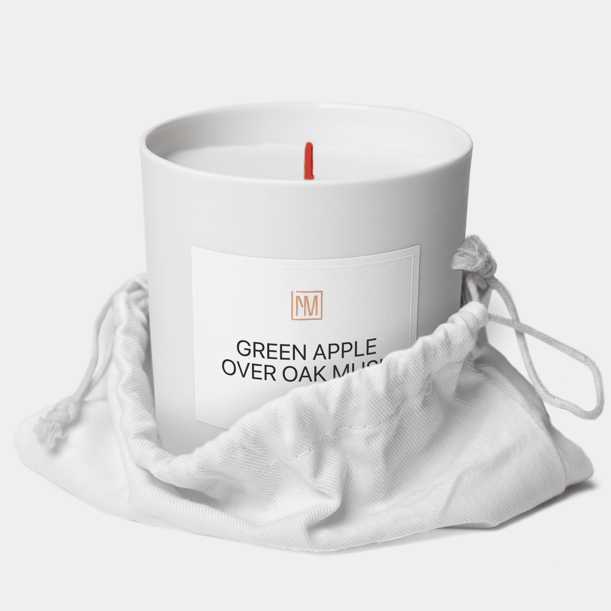 green apple over oak moss scented candle in a bag