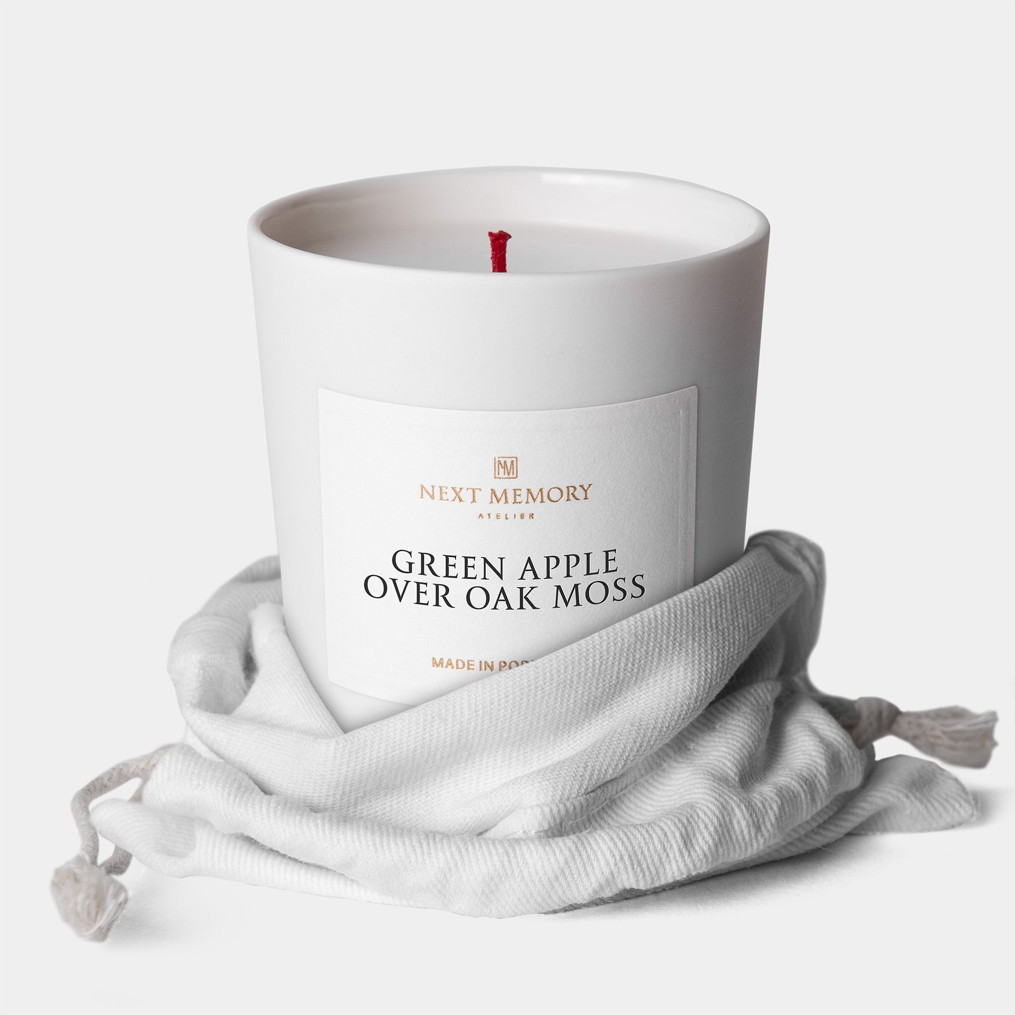 green apple over oak moss small candle in a bag