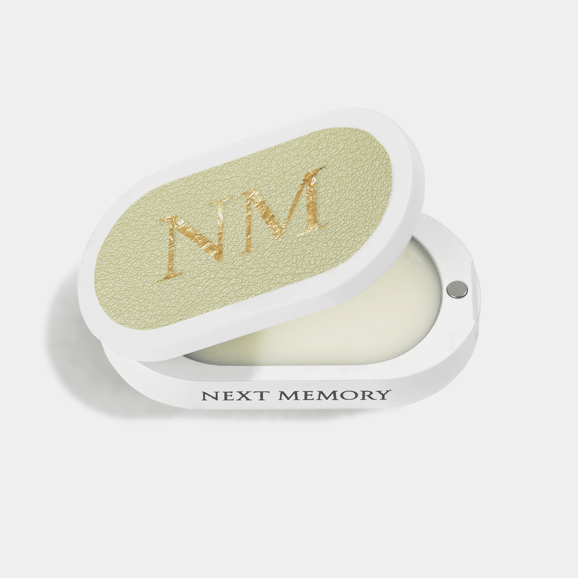 opened white solid perfume case with soft green leather and gold letters