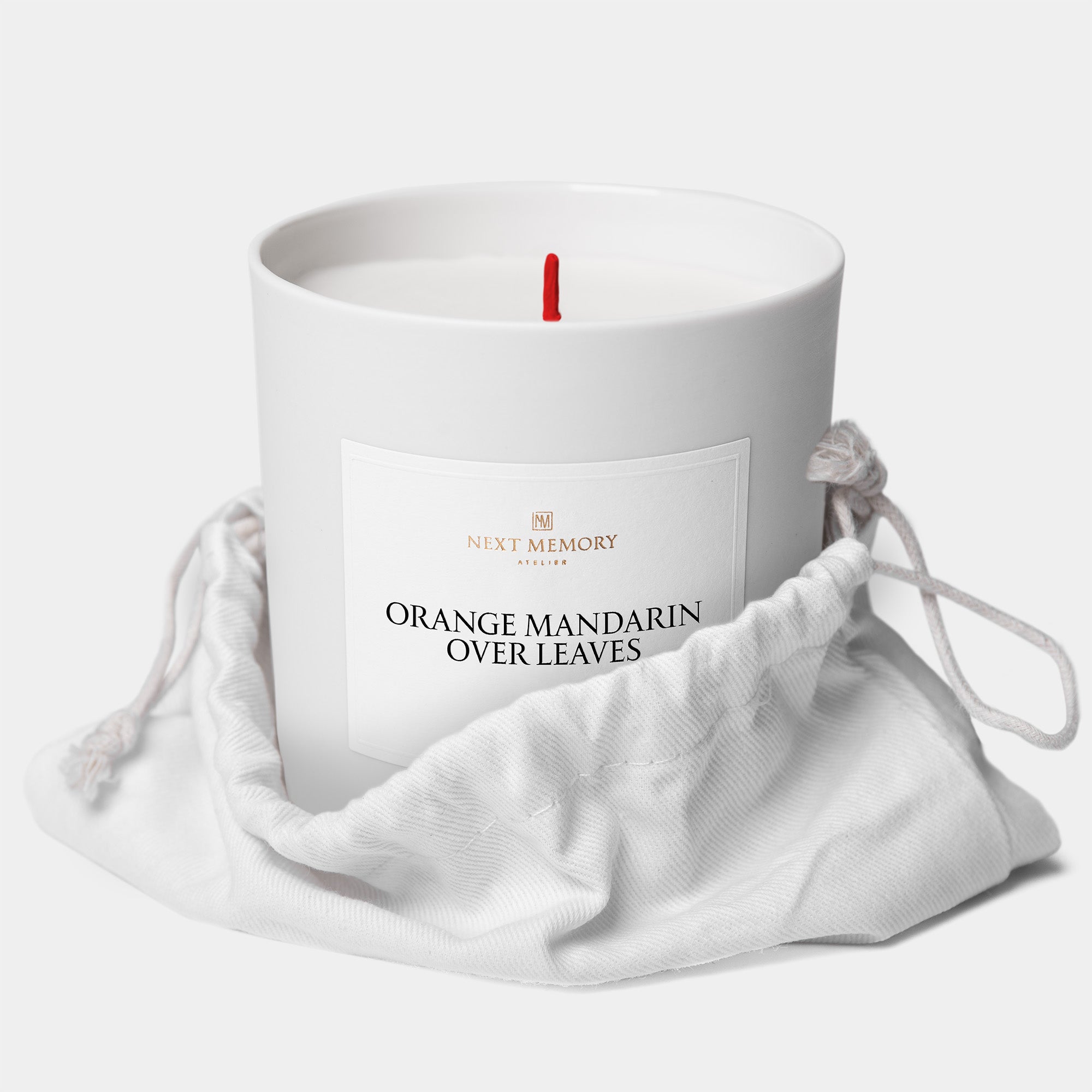 orange mandarin over leaves candle in a bag