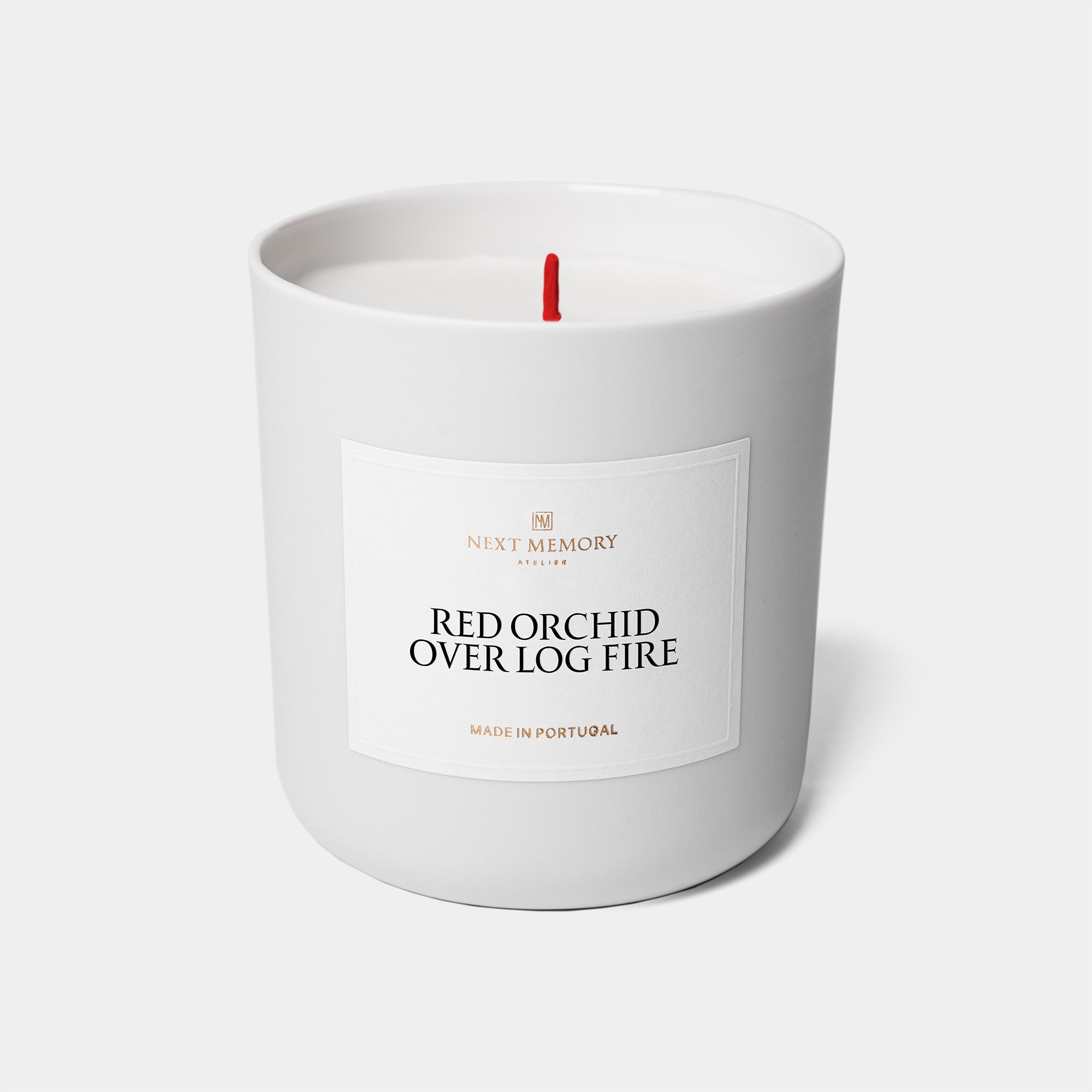 red orchid over log fire candle
