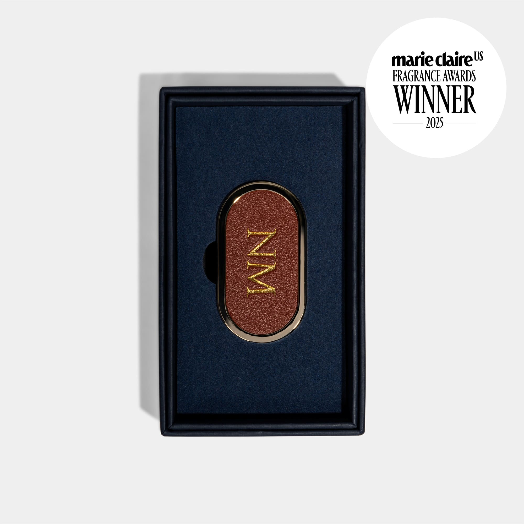 solid perfume case in a box packaging with marie claire awards