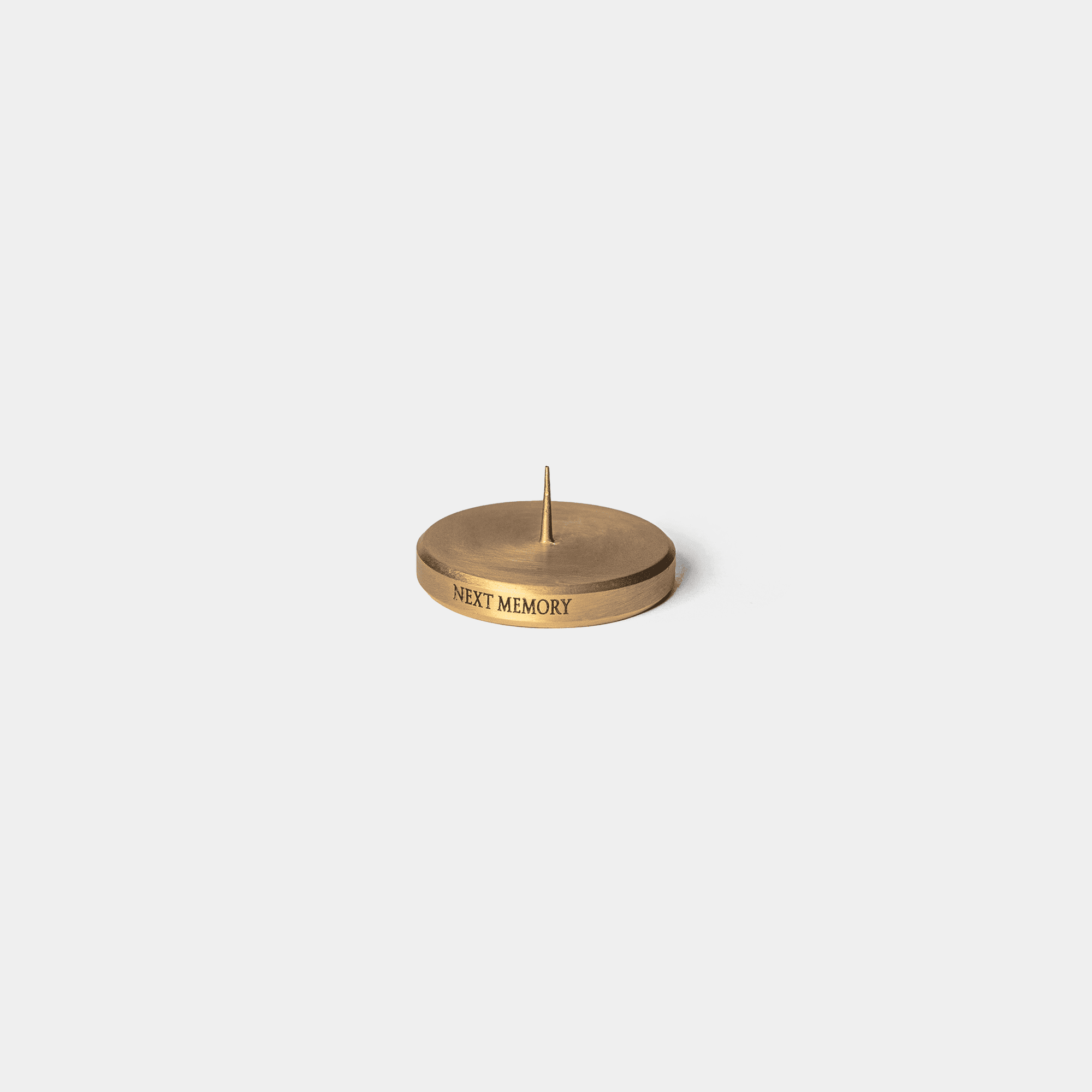 The_Brass_Taper_Candle_Disk_-_Detail
