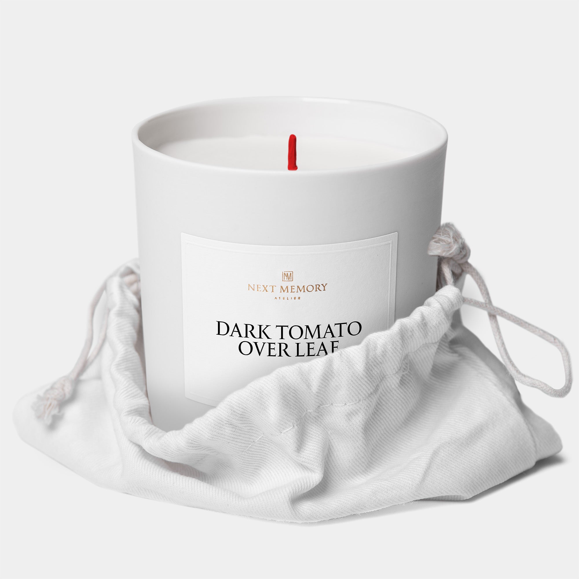 dark tomato over leaf candle in a bag