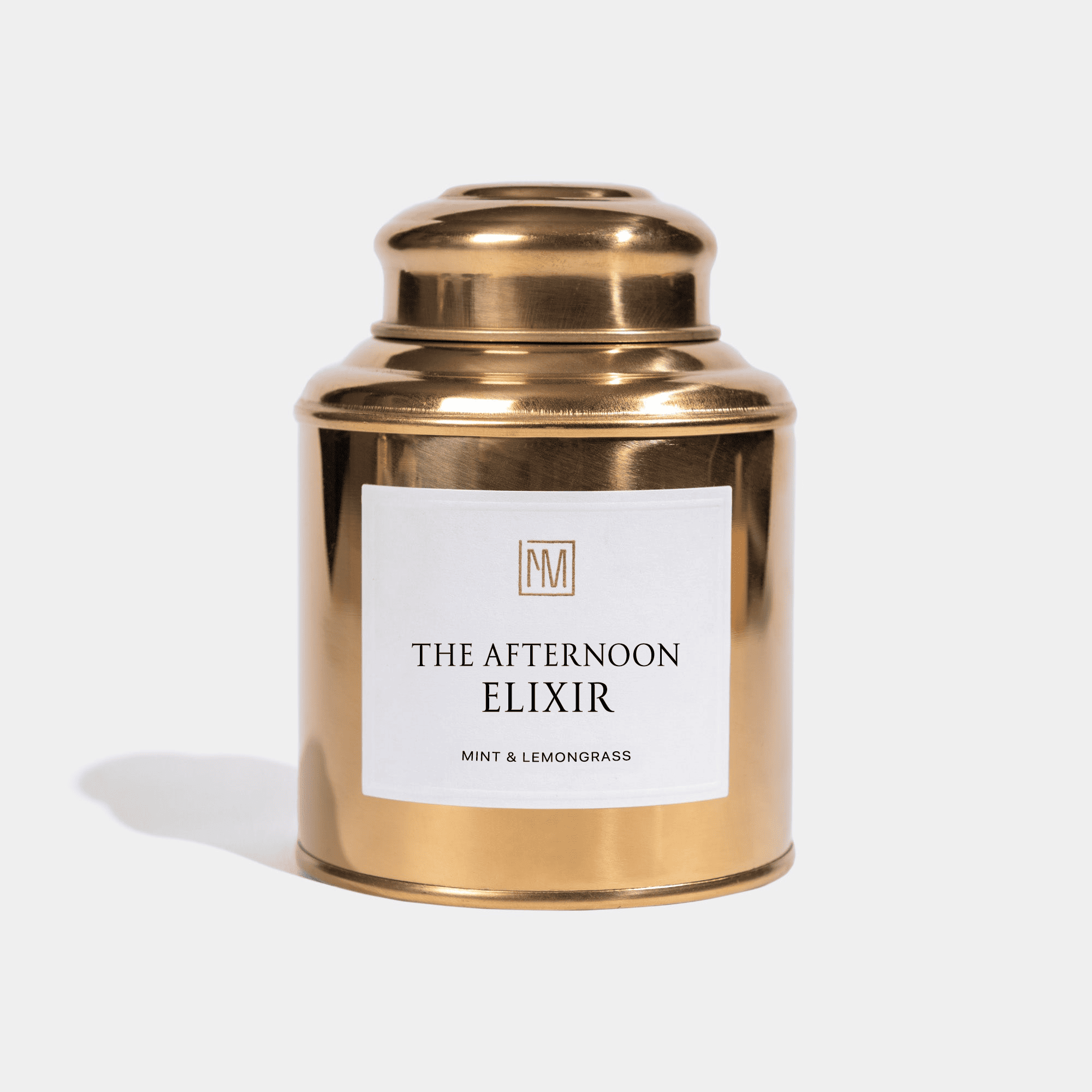 lata de chá dourado elixir da tarde